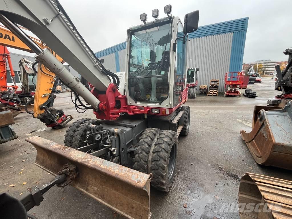 Takeuchi TB 295 W Колісні екскаватори