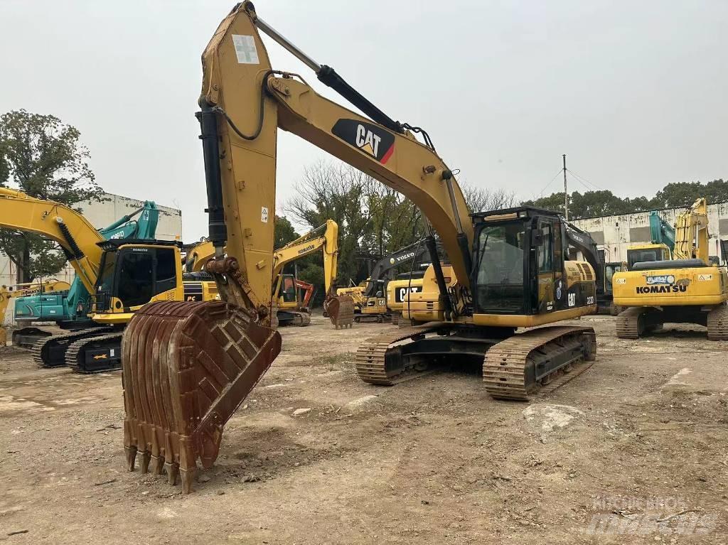 CAT 323D Гусеничні екскаватори