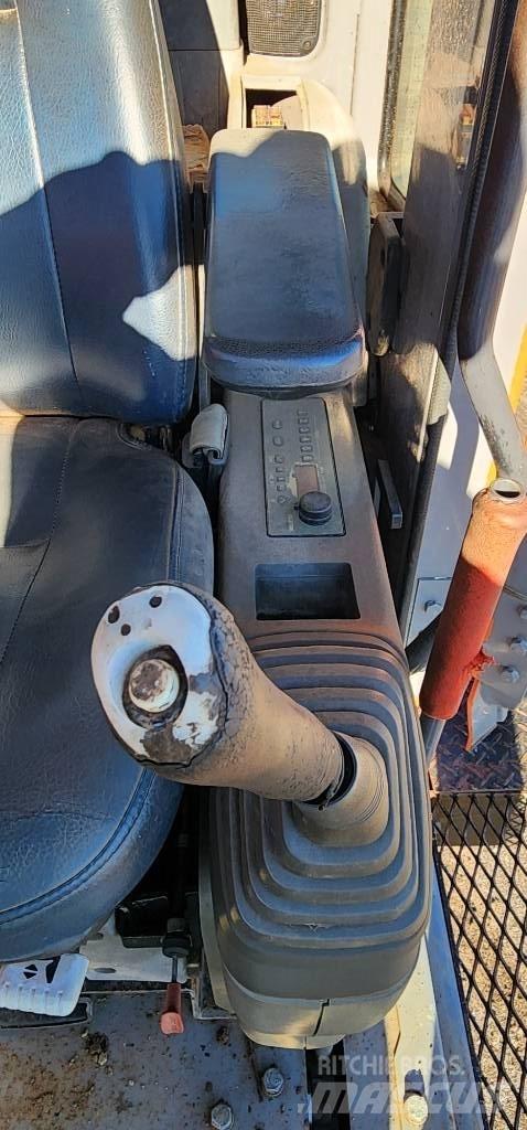 Hitachi ZX 225 USR Гусеничні екскаватори
