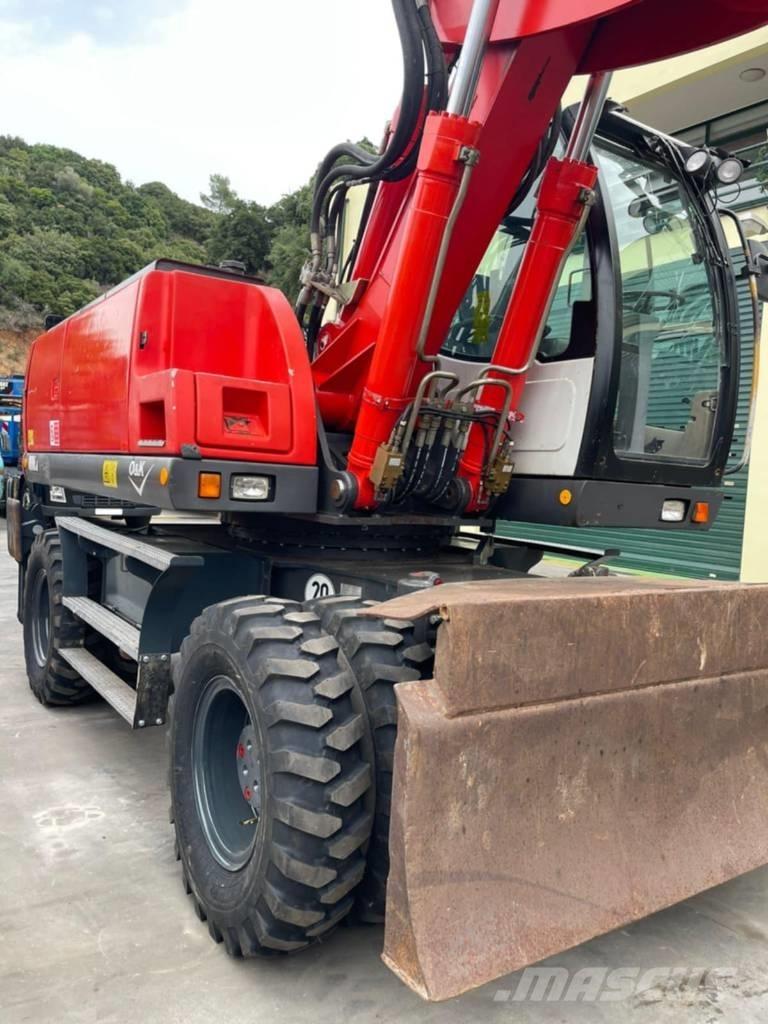 O&K MH 6.6 Колісні екскаватори