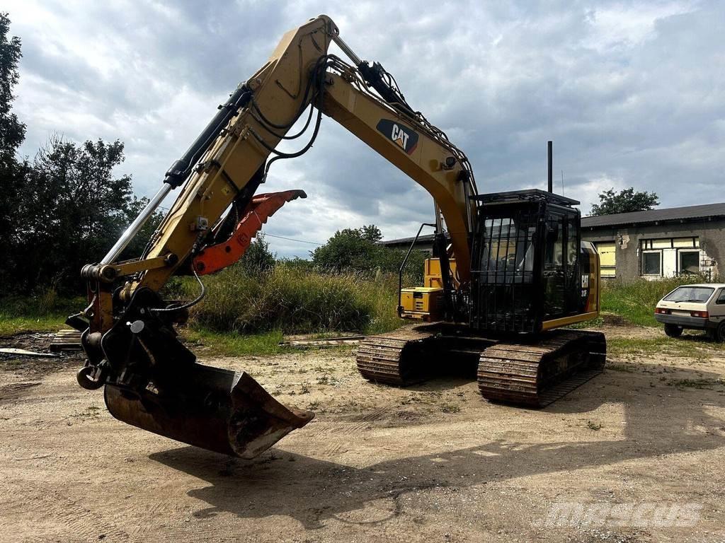 CAT 313FL Гусеничні екскаватори