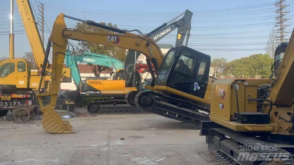CAT 313 D Гусеничні екскаватори