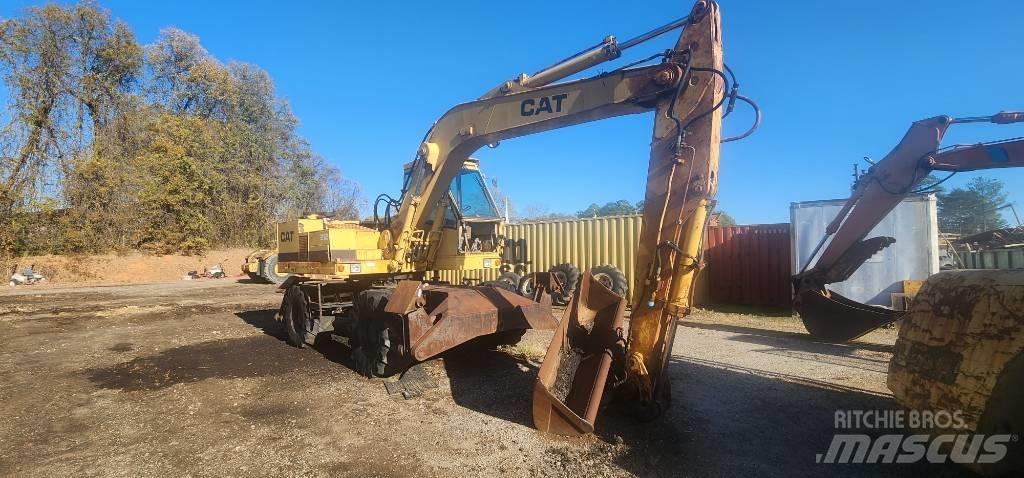 CAT 212 Колісні екскаватори