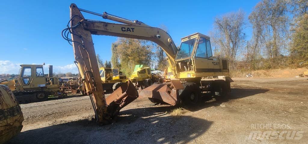 CAT 212 Колісні екскаватори