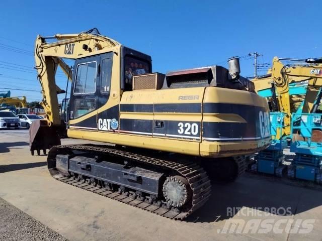 CAT 320 Гусеничні екскаватори