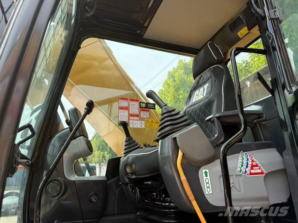 CAT 324 Гусеничні екскаватори