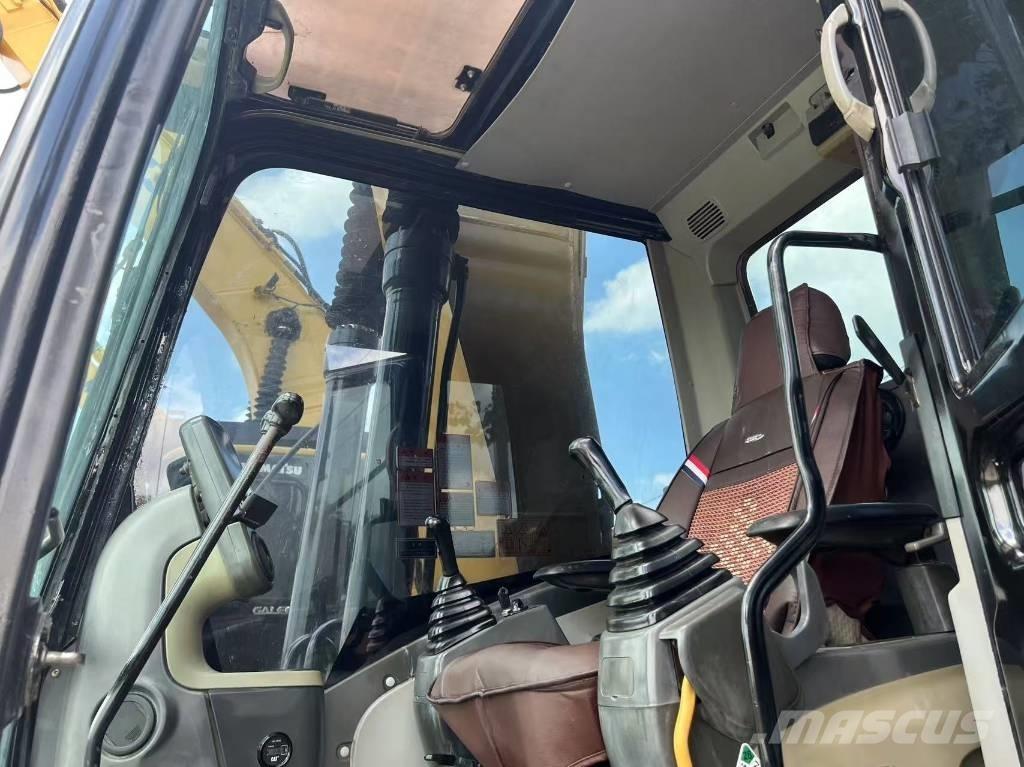 CAT 323DL Гусеничні екскаватори