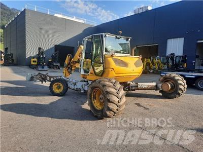 Menzi Muck M525 Колісні екскаватори