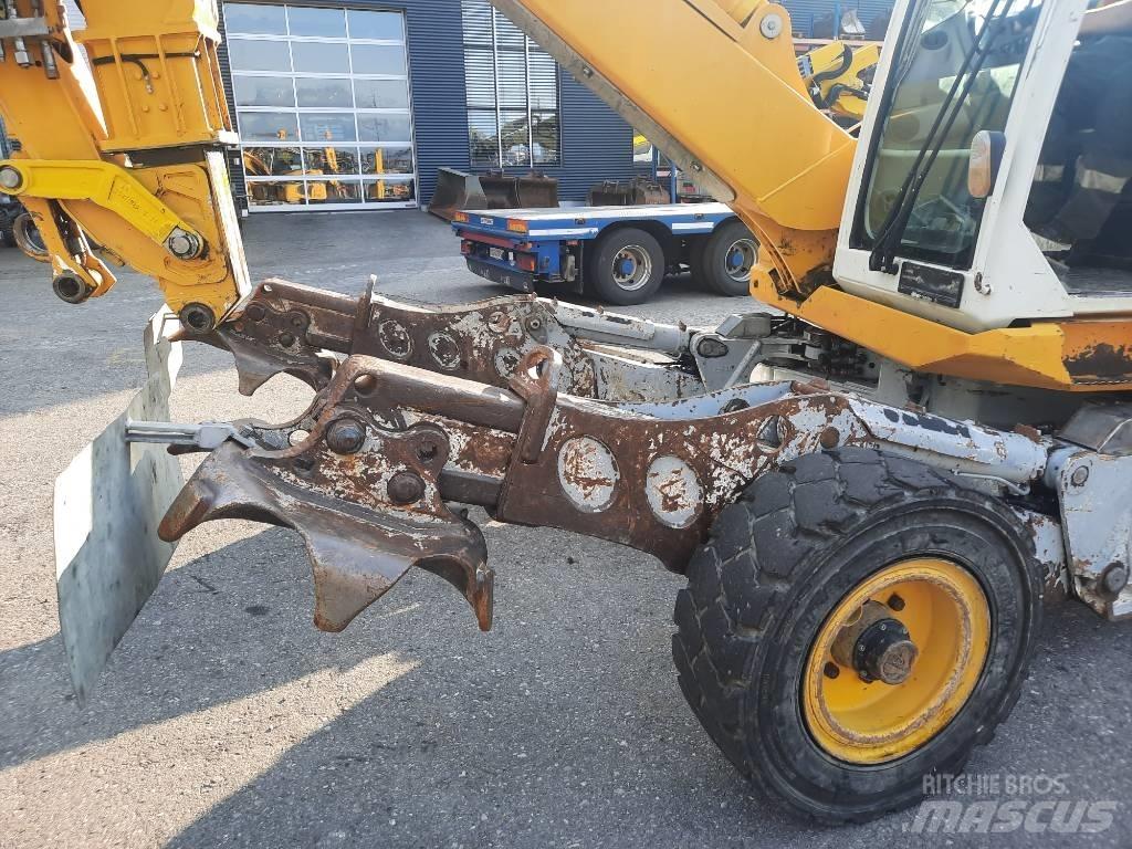 Menzi Muck M525 Колісні екскаватори