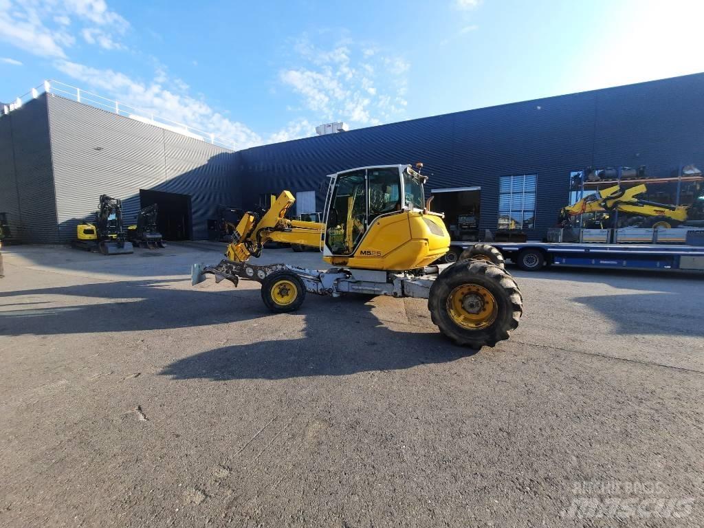 Menzi Muck M525 Колісні екскаватори