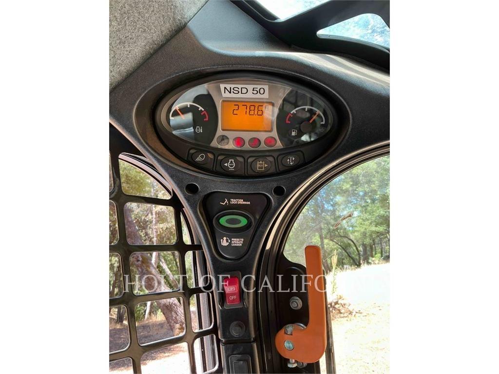 Bobcat T550 Гусеничні вантажники