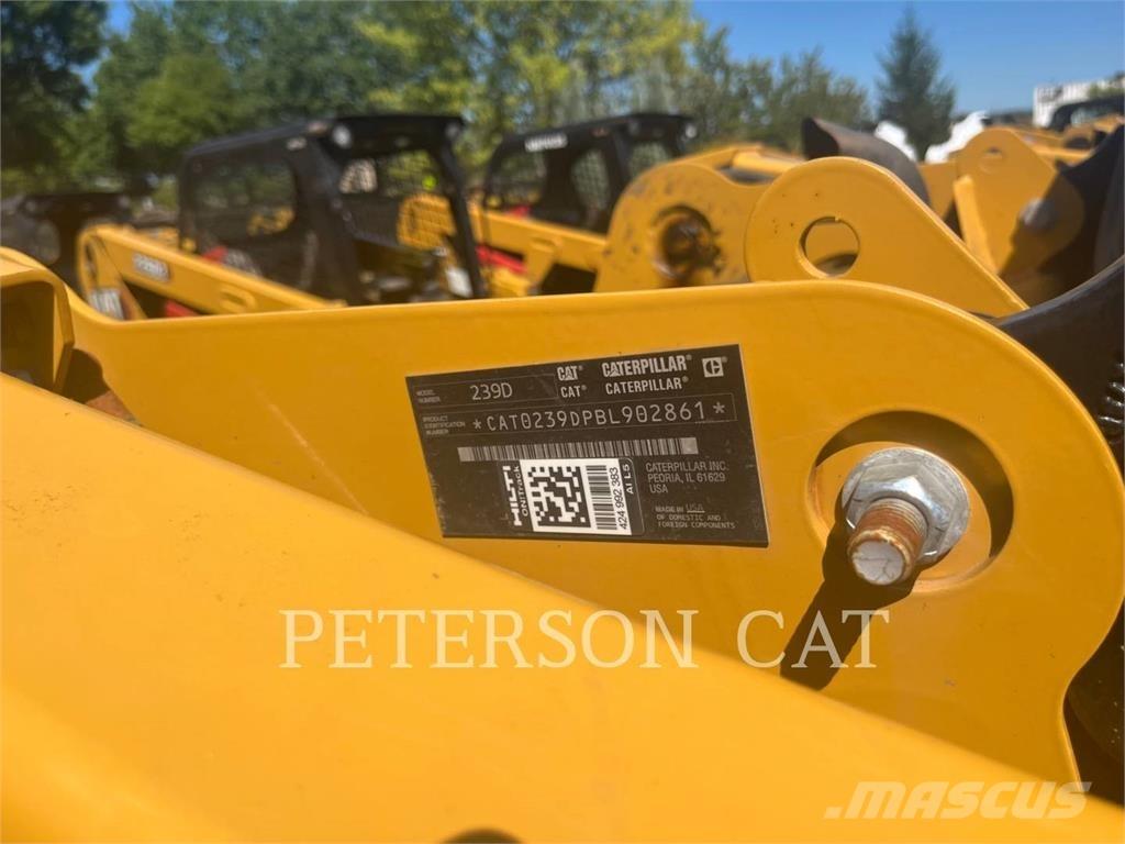 CAT 239D Гусеничні вантажники
