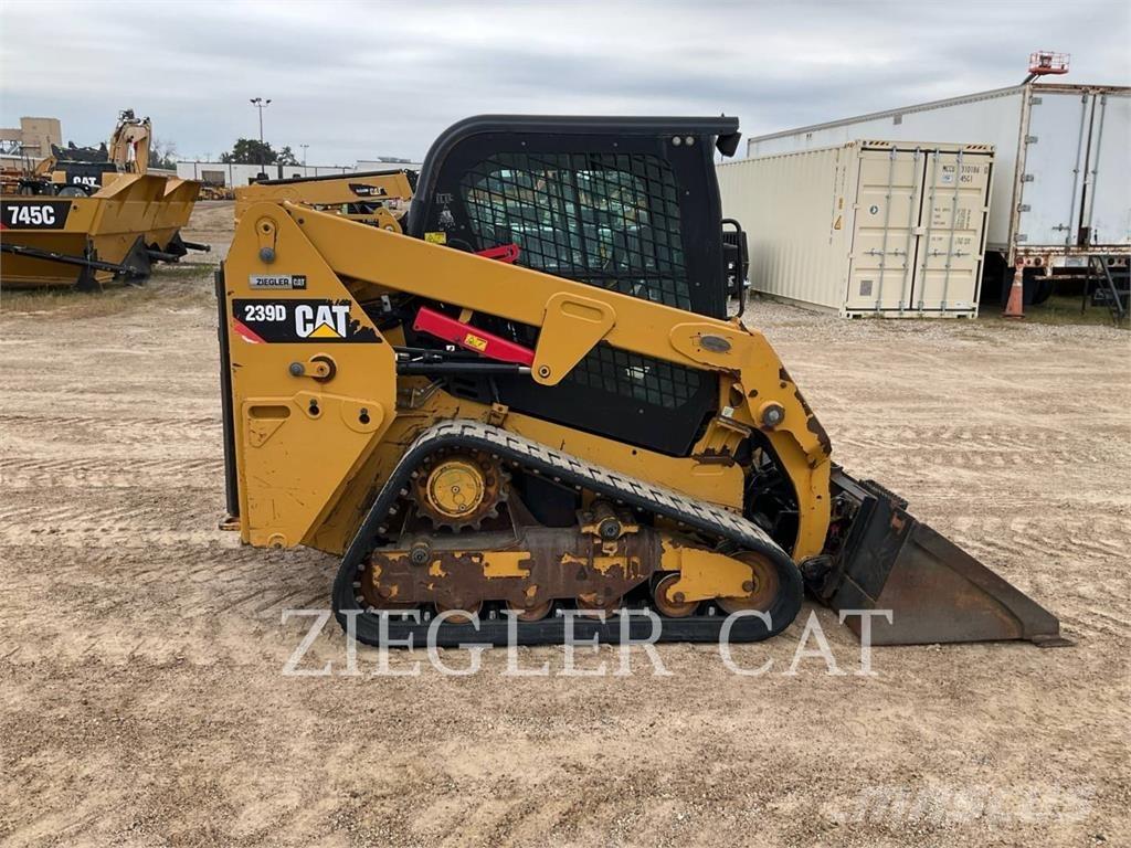 CAT 239D Гусеничні вантажники