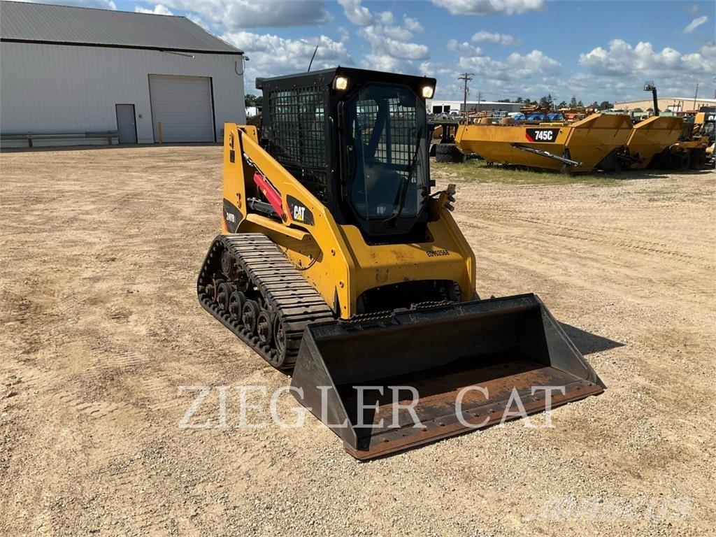 CAT 247B3 Гусеничні вантажники