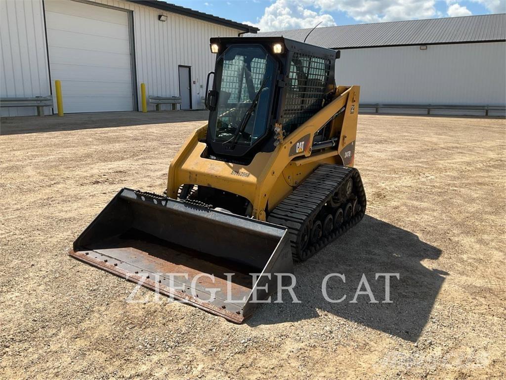 CAT 247B3 Гусеничні вантажники