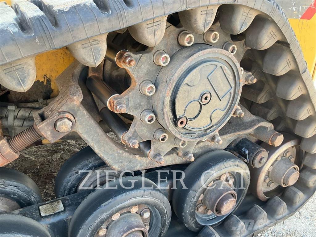 CAT 247B3 Гусеничні вантажники