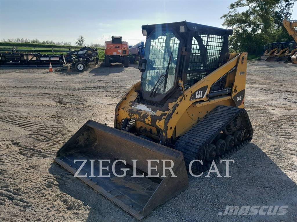 CAT 247B3 Гусеничні вантажники
