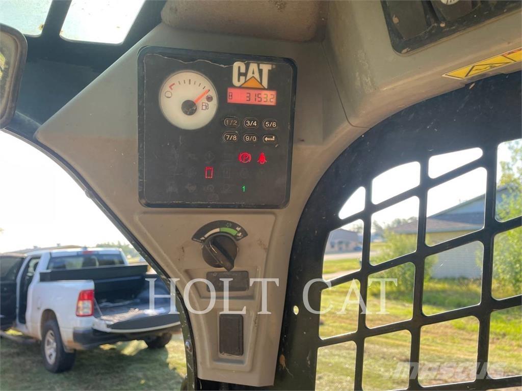 CAT 249D Гусеничні вантажники