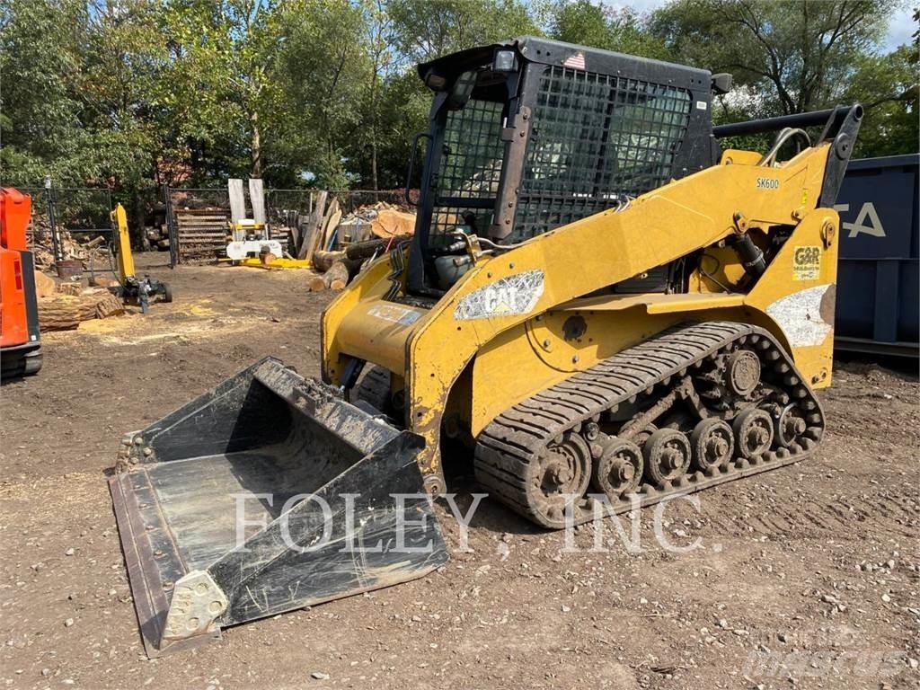 CAT 257B3 Гусеничні вантажники
