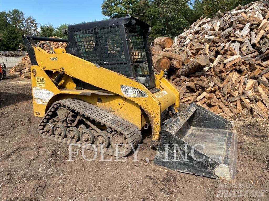 CAT 257B3 Гусеничні вантажники