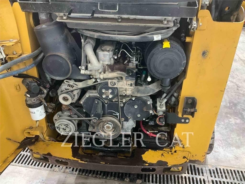 CAT 257B3 Гусеничні вантажники