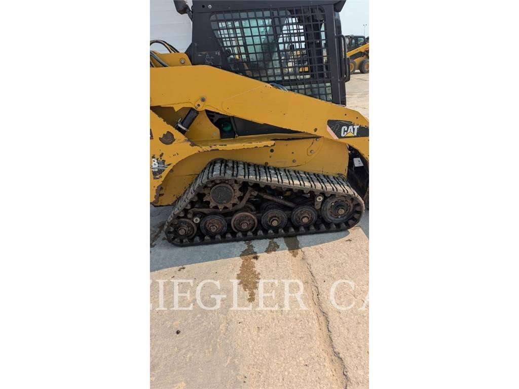 CAT 257B3 Гусеничні вантажники