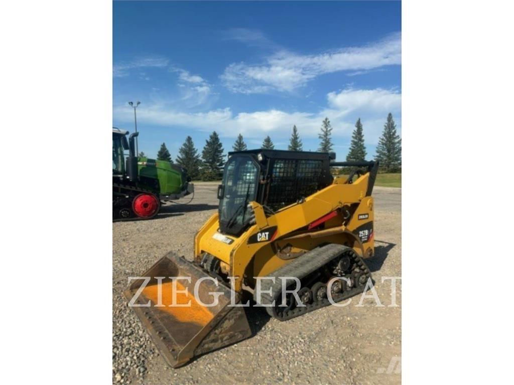 CAT 257B3 Гусеничні вантажники