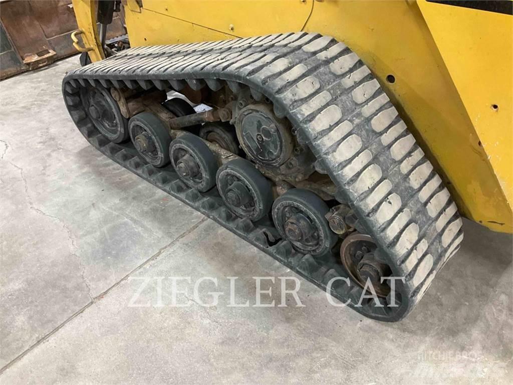 CAT 257D Гусеничні вантажники