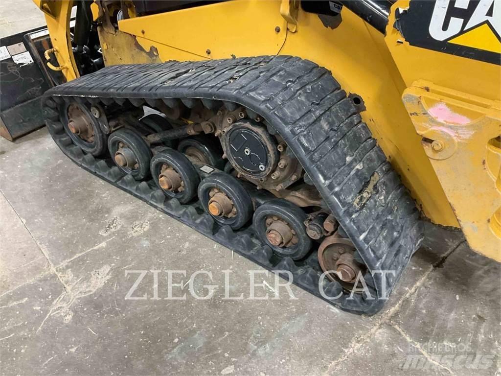 CAT 257D Гусеничні вантажники