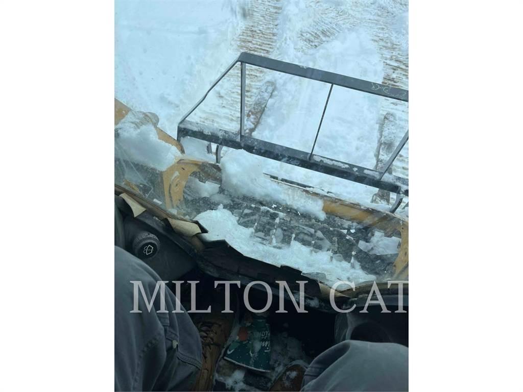 CAT 257D Гусеничні вантажники