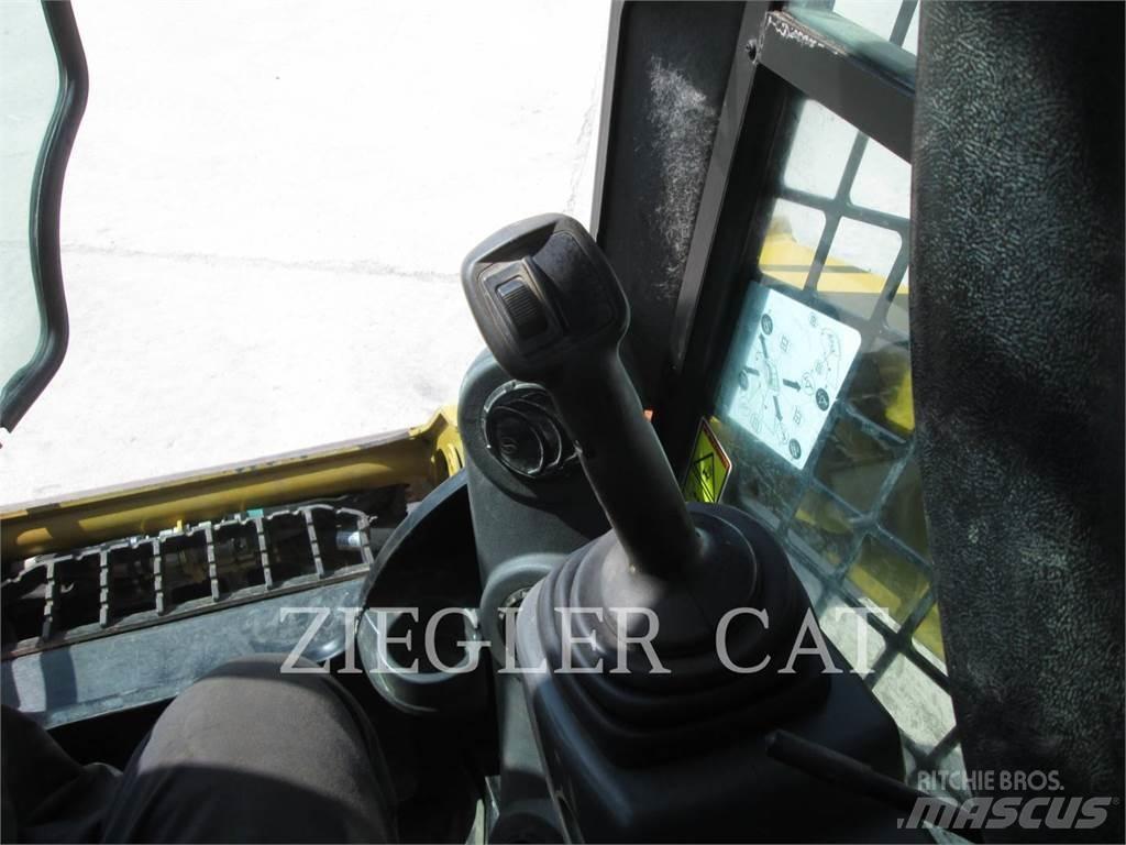 CAT 257D Гусеничні вантажники