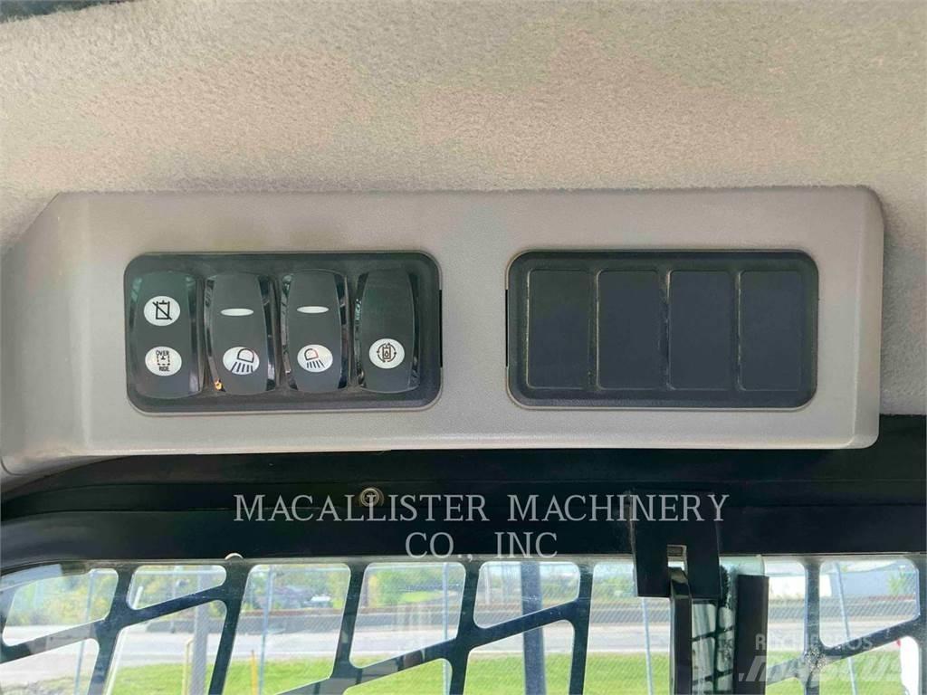 CAT 257D Гусеничні вантажники