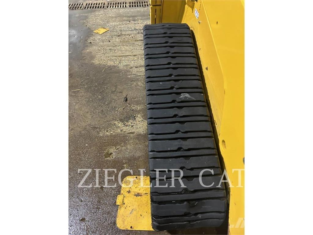 CAT 257D Гусеничні вантажники