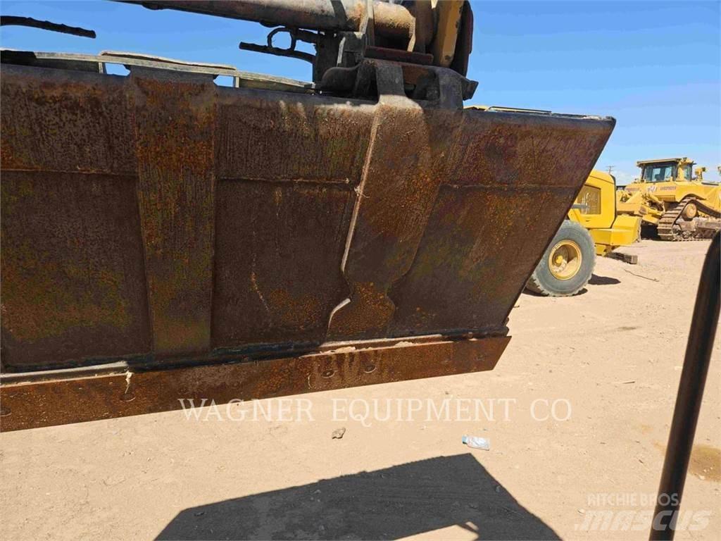 CAT 259D Гусеничні вантажники