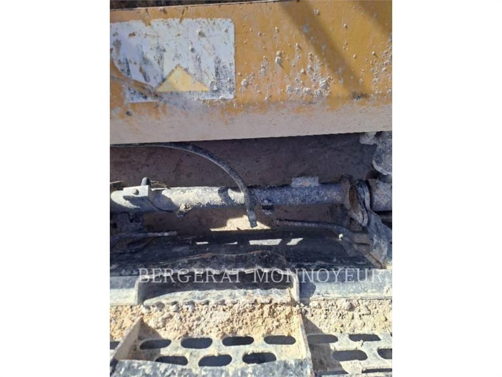 CAT 259D Гусеничні вантажники