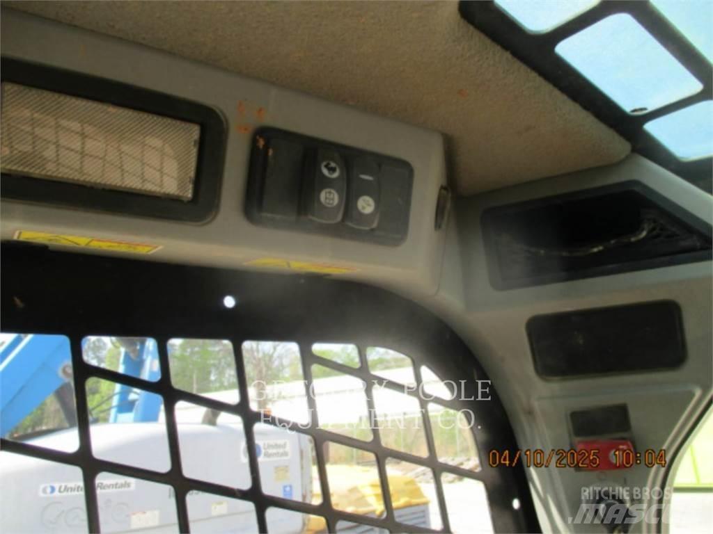 CAT 259D Гусеничні вантажники