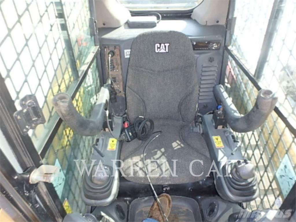 CAT 259D Гусеничні вантажники