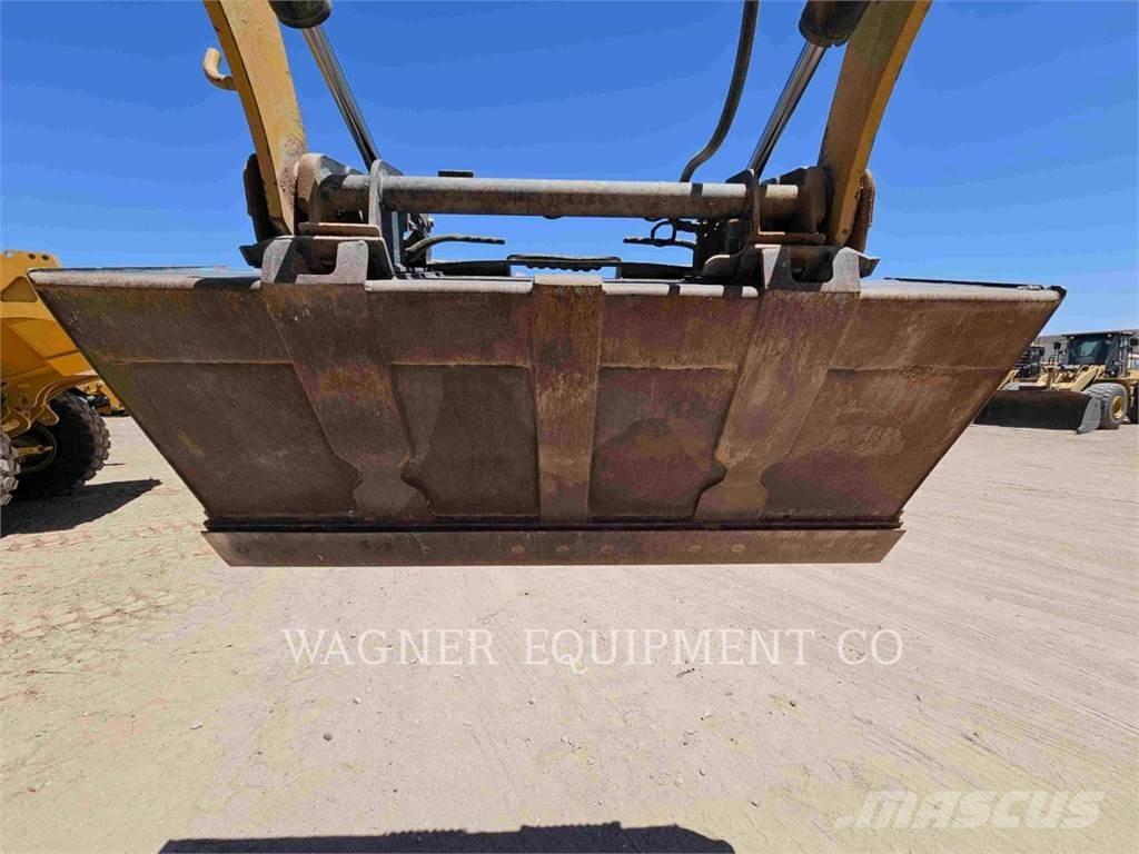 CAT 259D Гусеничні вантажники