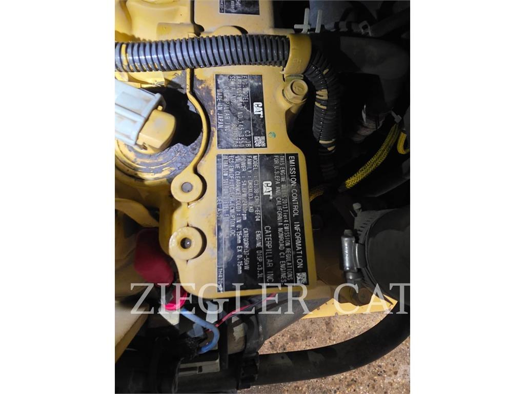 CAT 259D Гусеничні вантажники