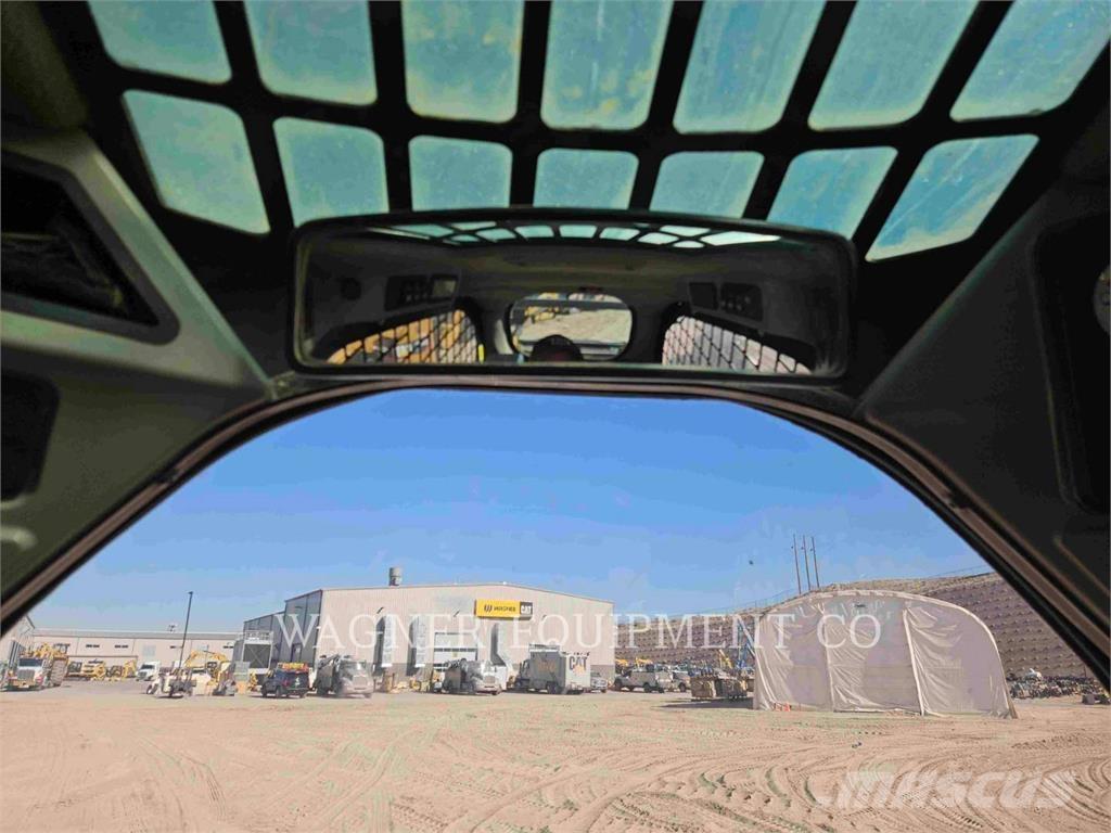 CAT 259D Гусеничні вантажники