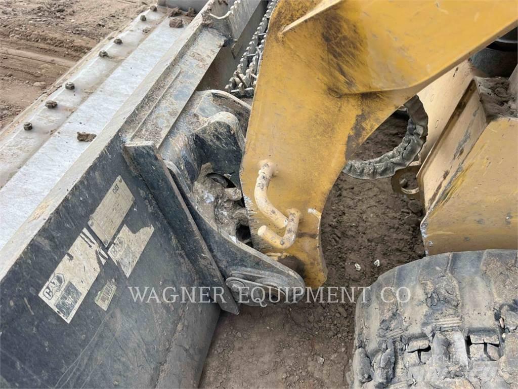 CAT 259D3 Гусеничні вантажники