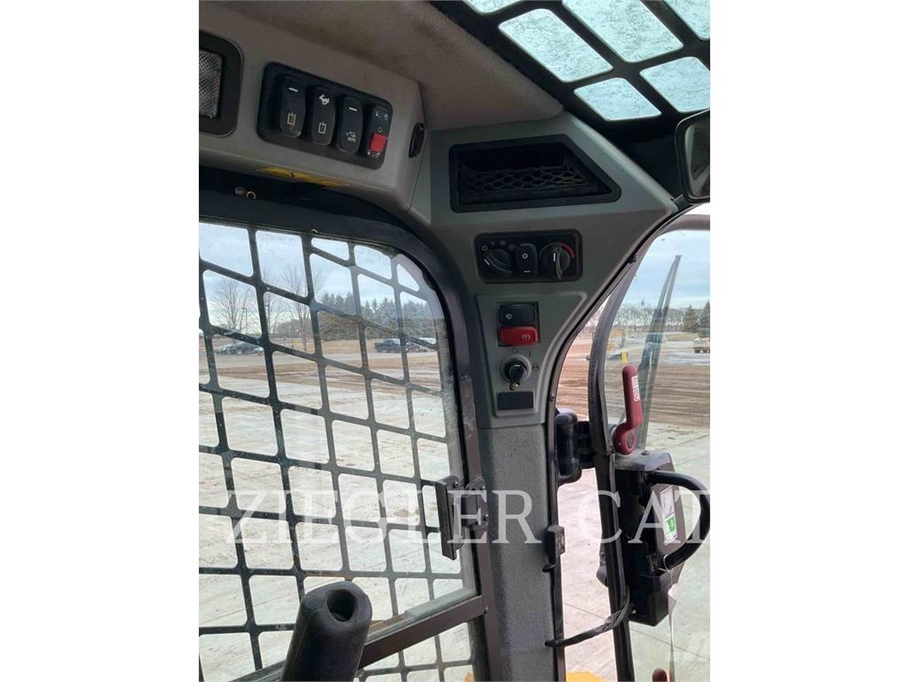 CAT 259D3 Гусеничні вантажники