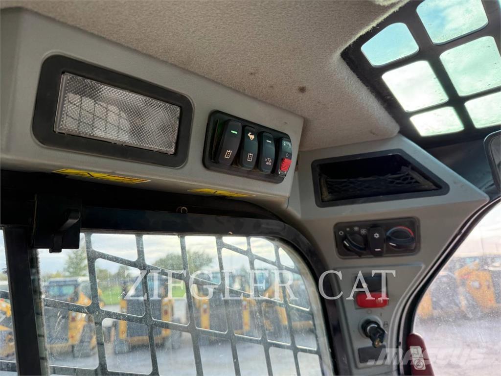 CAT 259D3 Гусеничні вантажники