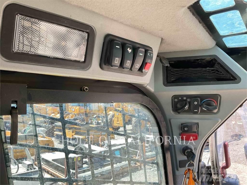 CAT 259D3 Гусеничні вантажники