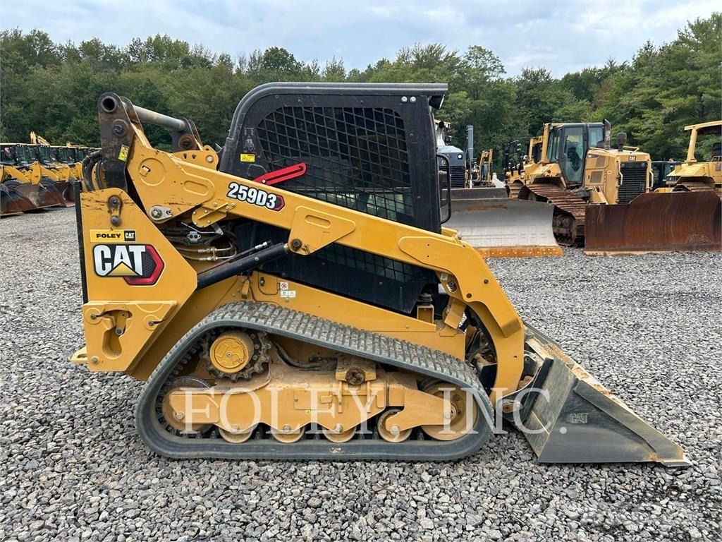 CAT 259D3 Гусеничні вантажники