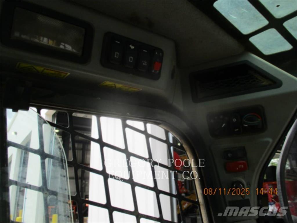 CAT 259D3 Гусеничні вантажники