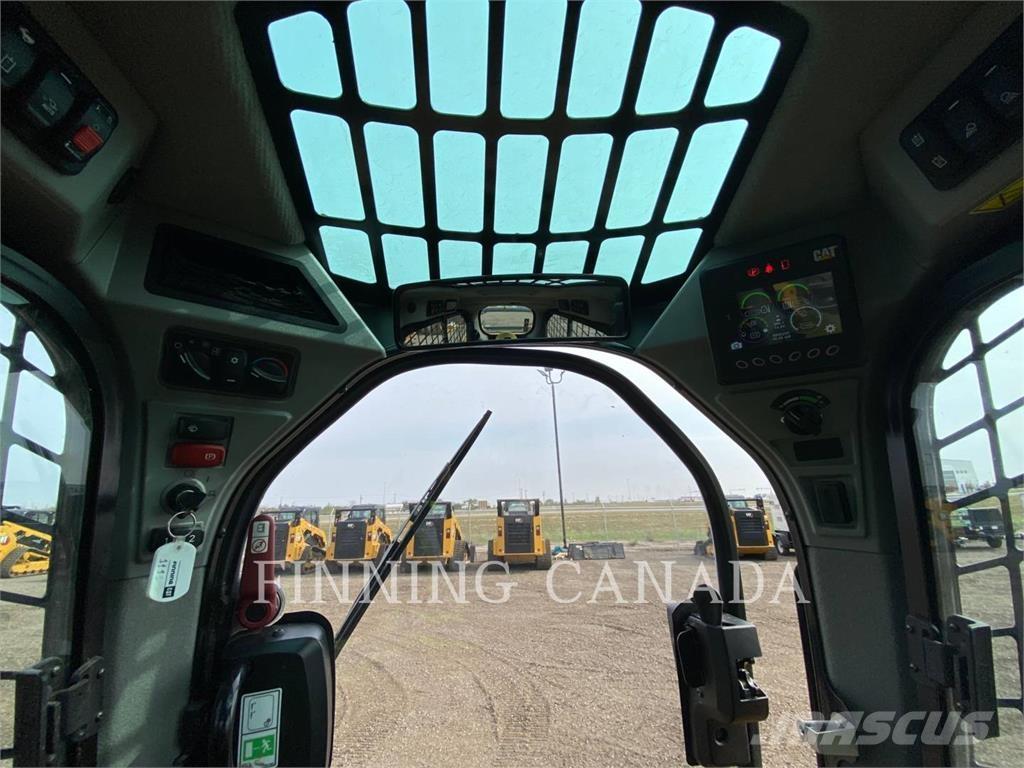 CAT 259D3 Гусеничні вантажники