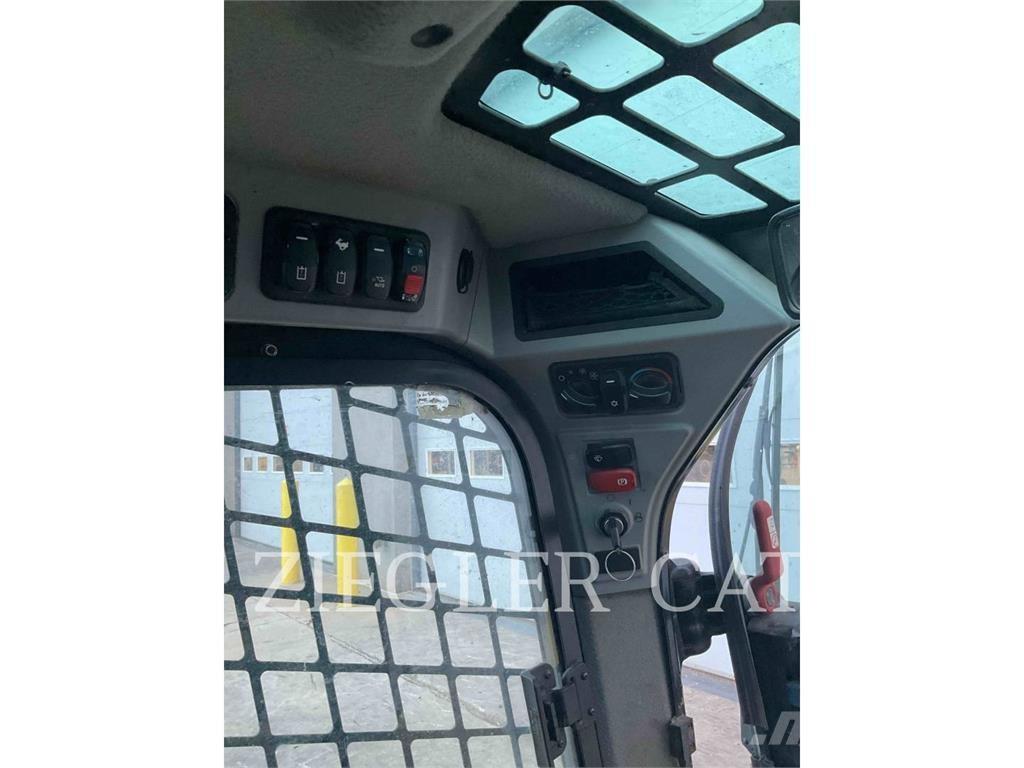 CAT 259D3 Гусеничні вантажники