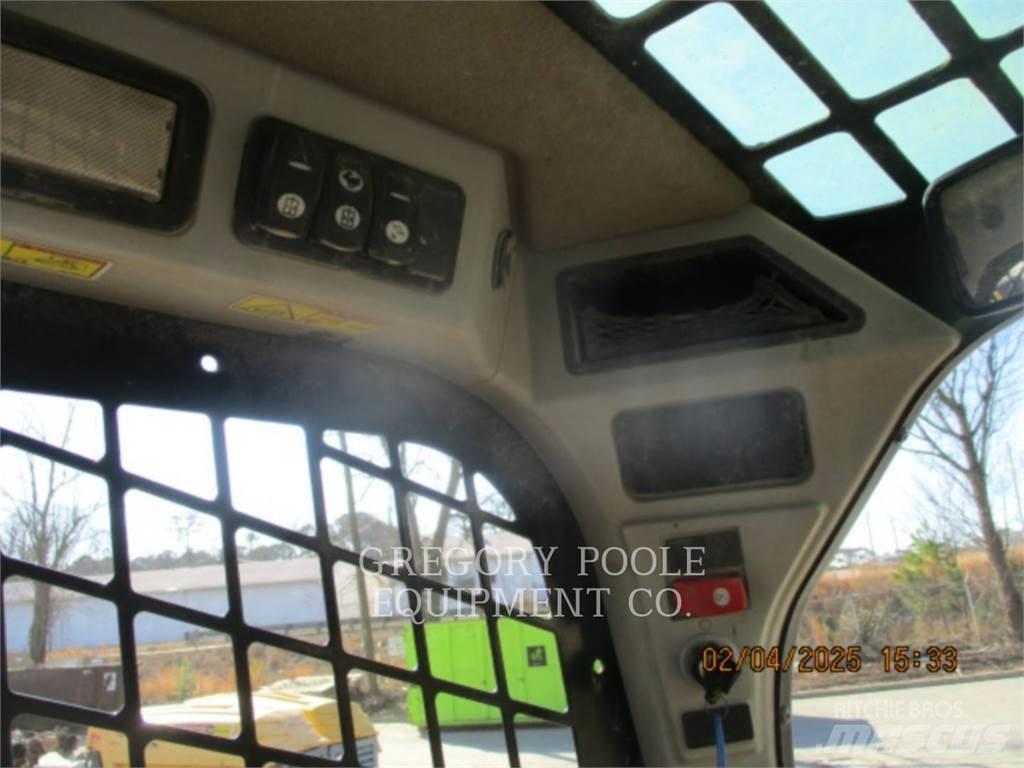 CAT 279D Гусеничні вантажники