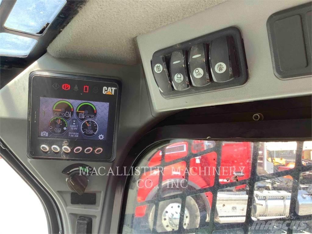 CAT 289D Гусеничні вантажники